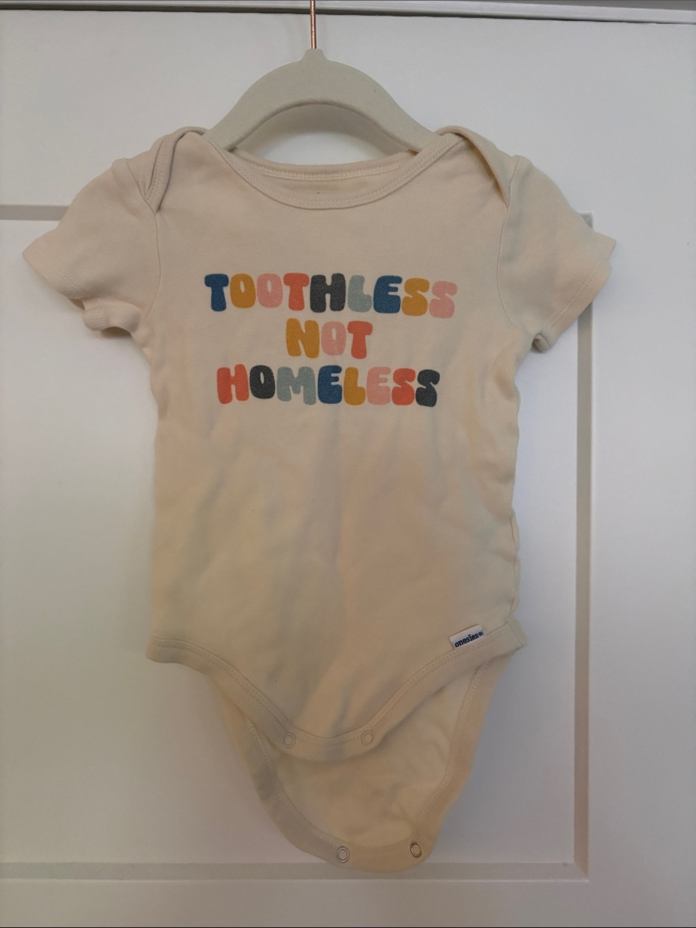 Gerber’s Cream Bravo TV: 'Toothless Not Homeless' Baby One-Piece 9 Months